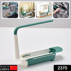Versatile expandable dish drainer basket holding dishes, cutlery, and cleaning supplies above a sink.