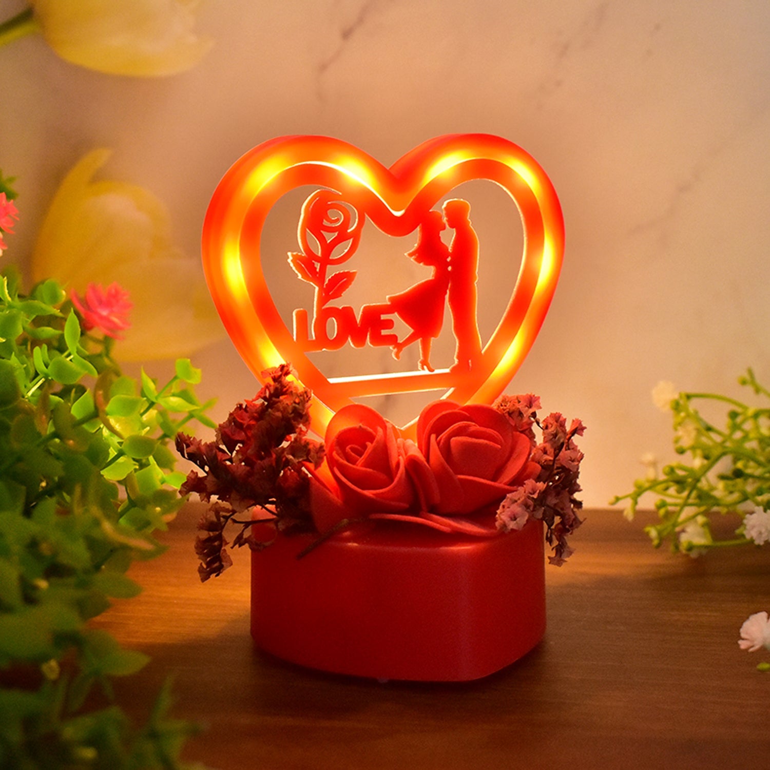 Heart-shaped love couple decorative showpiece with rose base and LED light