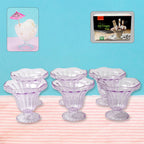 A top-down view of the crystal-clear plastic ice cream bowls.
