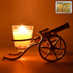 Top Cannon tealight candle holder with glowing candle for Diwali decorations