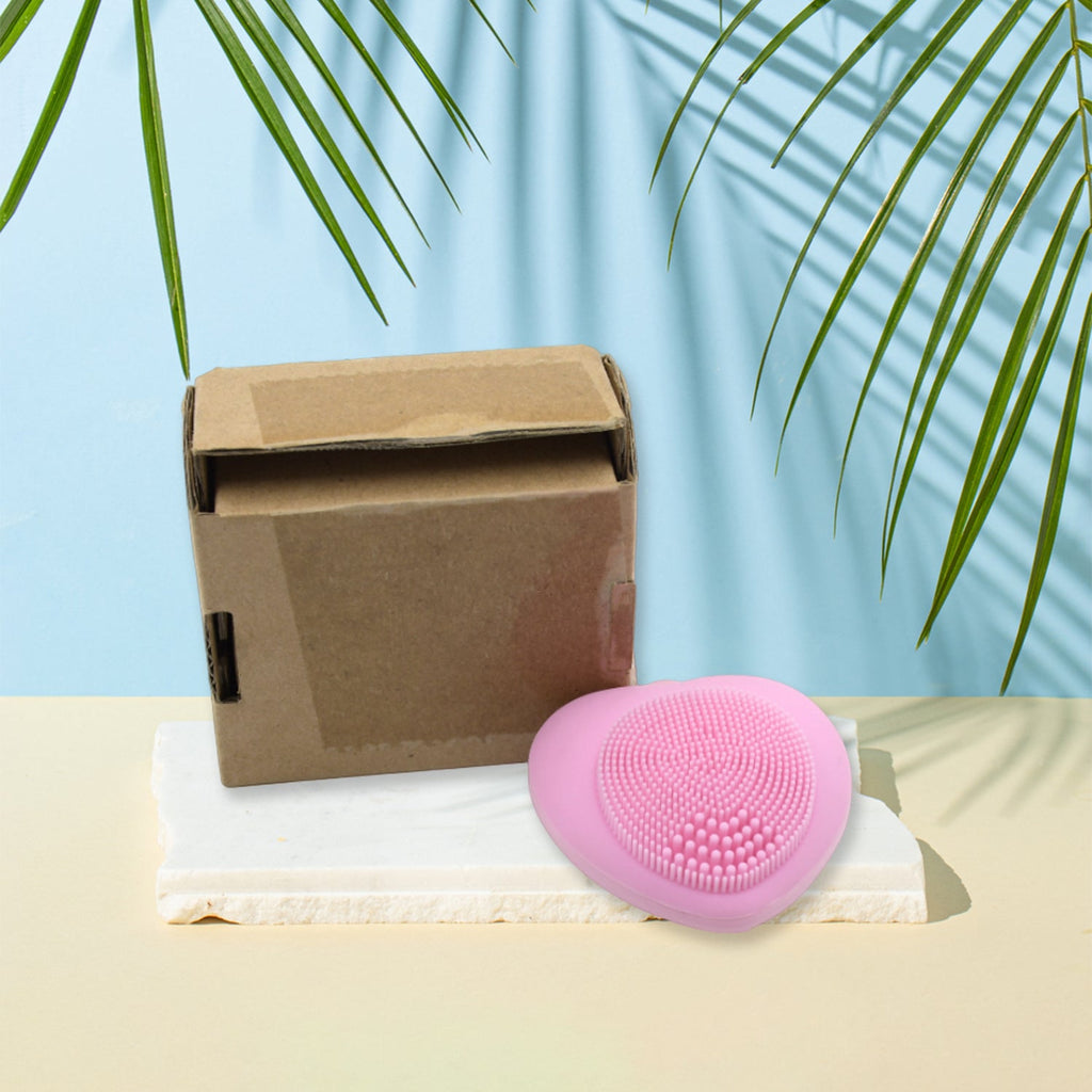 Waterproof heart-shaped silicone facial cleansing brush.