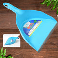 Heavy-duty plastic dustpan with a comfortable handle for efficient dust collection.