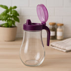 Oil and juice pourer bottle with leakproof cap and ergonomic handle