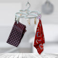 Heart-shaped cloth drying rack with 8 clips for laundry.