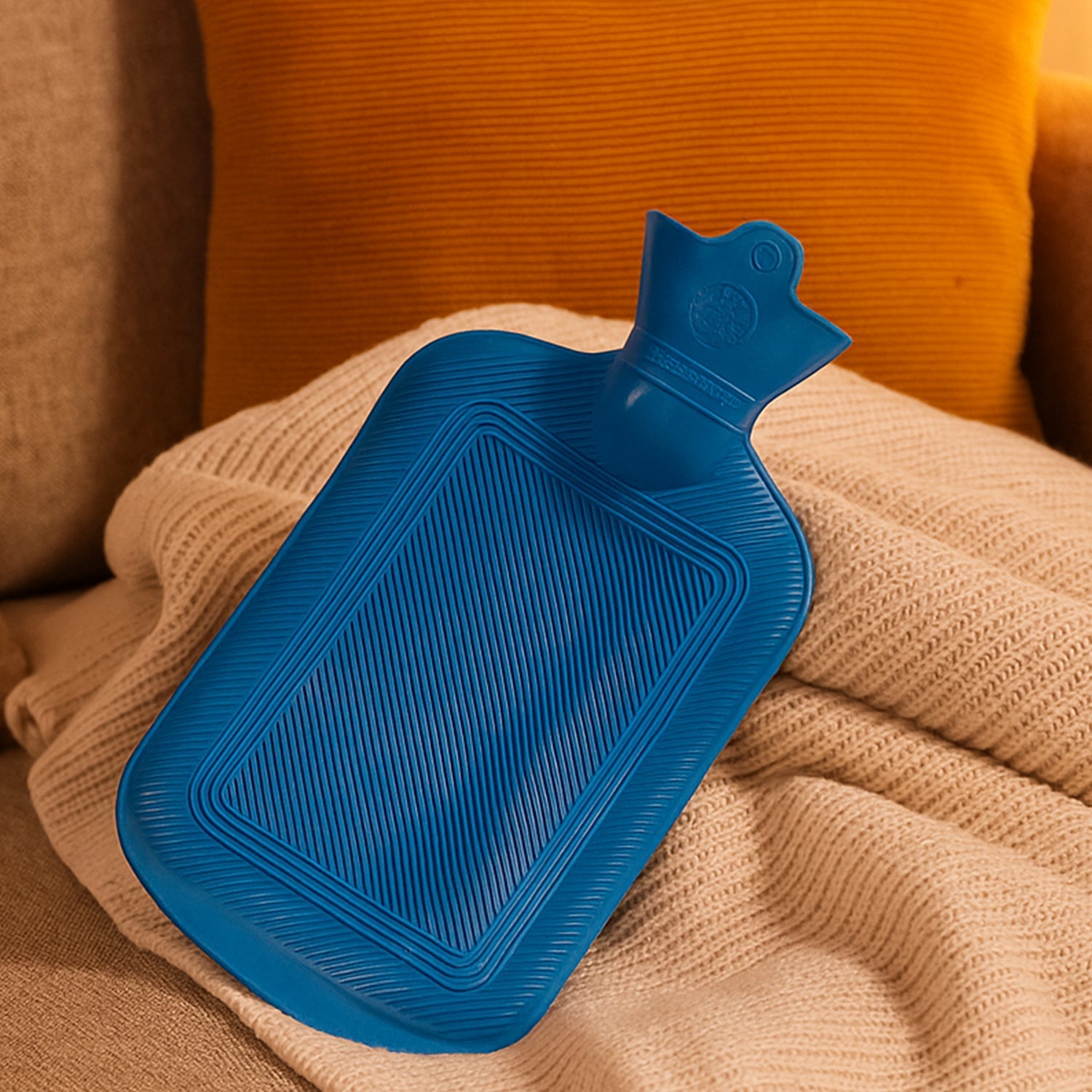 Red Rubber Hot Water Bag, perfect for targeted muscle pain relief and warmth.