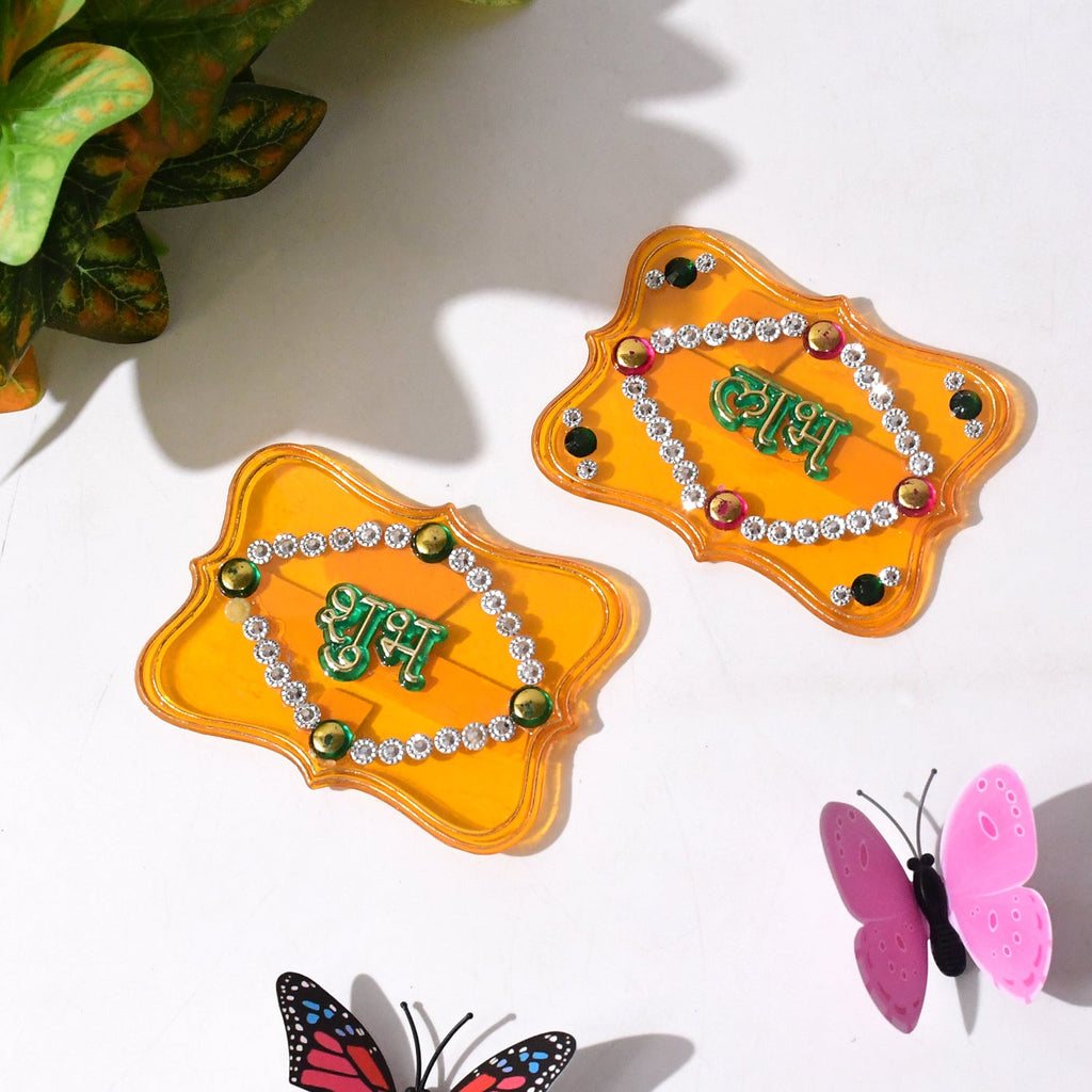 Close-up of Shubh Labh wall hanging set featuring glitter and stone embellishments