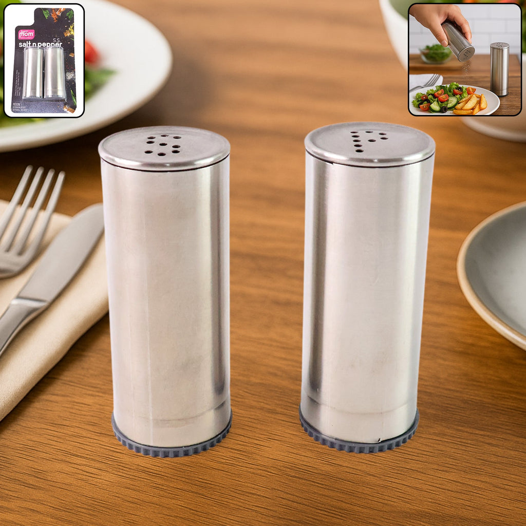 Stainless steel salt and pepper shaker set with brushed finish on kitchen table