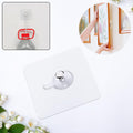 Strong adhesive photo frame wall hook on white background