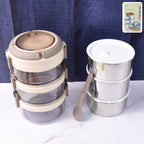 Insulated stainless steel lunch box with triple-layer containers and secure clip locks