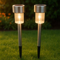 Set of two solar garden pathway lights with stainless steel finish for outdoor use