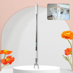 Telescopic clothes hook extended, reaching high garments in a closet.
