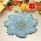 A yellow flower shaped plastic plate holding a child's meal, demonstrating its practical use for kids' dinnerware.