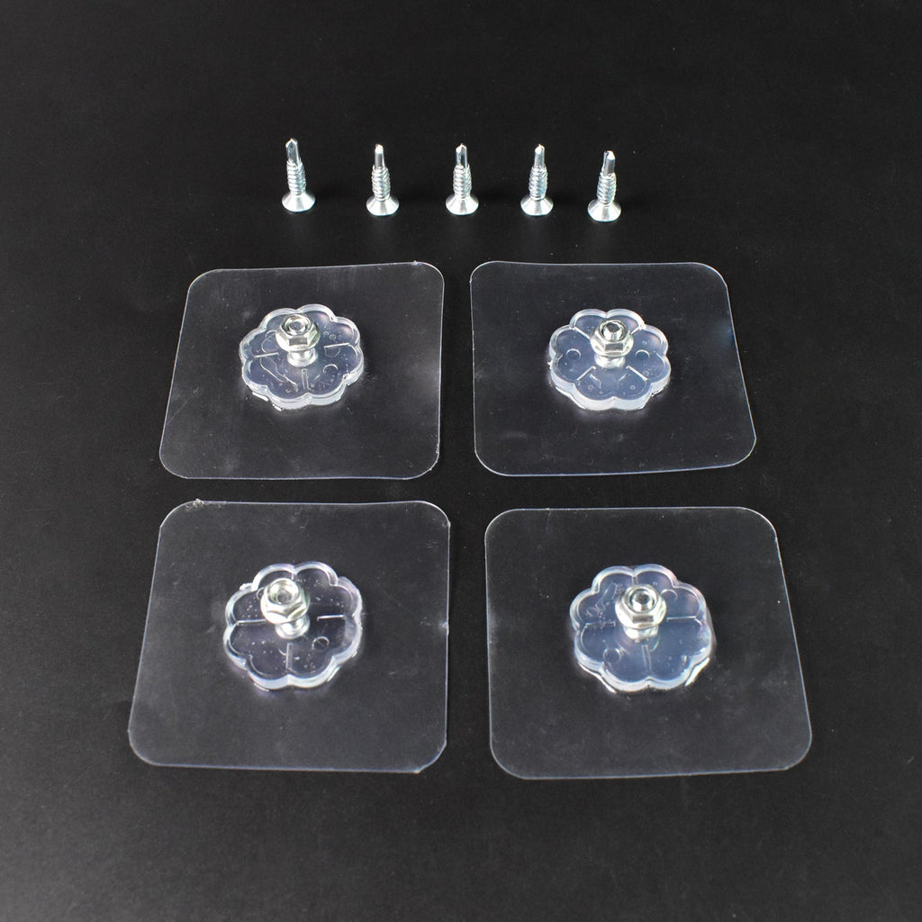 Set of four heavy-duty self adhesive hooks holding kitchen utensils and a clock.