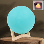 A serene blue Moon Night Lamp illuminating a dark room, creating a calming ambiance.