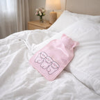 Mini hot and cold water bag lying flat on a surface showing compact size