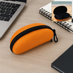 A black zipper sunglasses case displayed open, showing the soft interior lining.