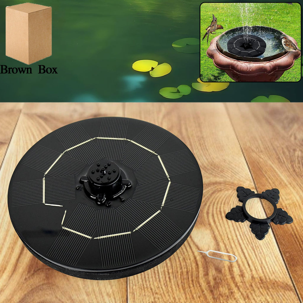 Solar-powered floating fountain pump on a bird bath creating water spray patterns