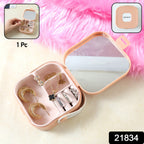 Open mini jewelry organizer with mirror and multiple compartments