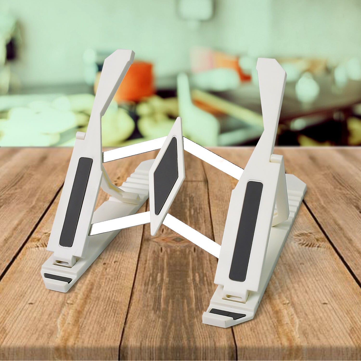 PHOBIA Adjustable Mobile Stand supporting a smartphone on a desk.