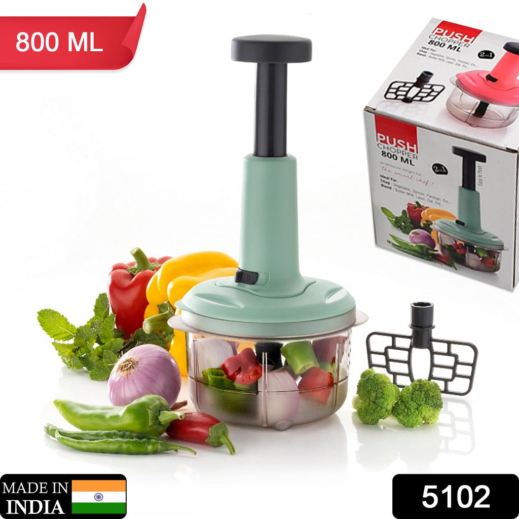 Manual food chopper featuring sharp stainless steel blades for efficient kitchen prep.