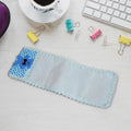 Cartoon cloth remote control cover, 24x8cm, for TV and AC remotes.
