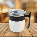 Thermal mug with ergonomic handle, ideal for keeping hot or cold beverages.