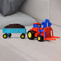 Vibrant yellow friction tractor toy with a red bricks trolley, ready for imaginative play.