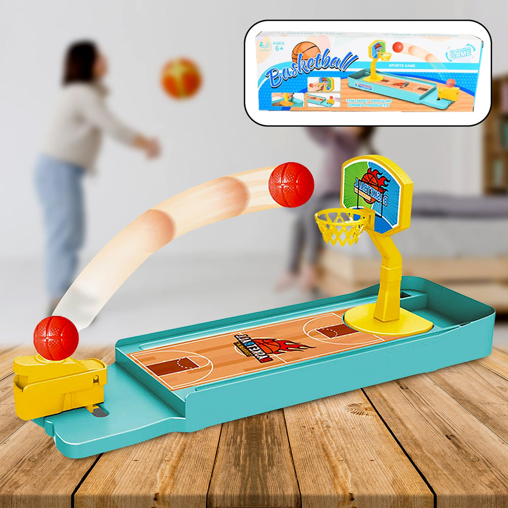 Close-up of the mini basketball hoop and launcher for the desktop game.