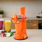 Manual Fruit Juicer with cup and waste collector on a white background.
