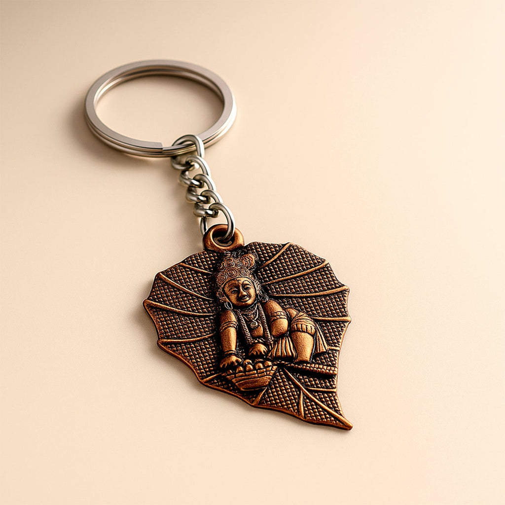 Bal Krishna keychain with antique bronze finish and peepal leaf design