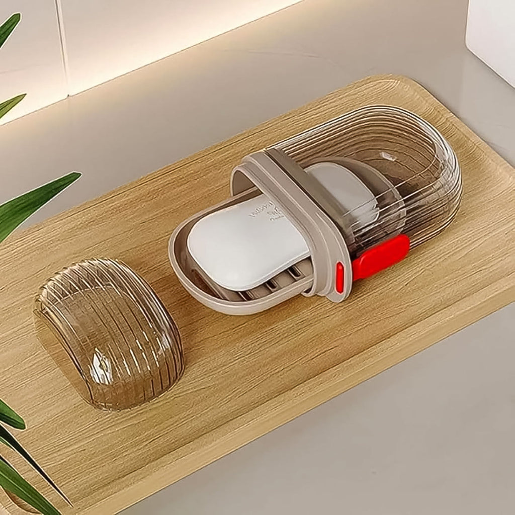 Clear plastic travel soap box with a secure lid, ideal for carrying solid soaps on trips.