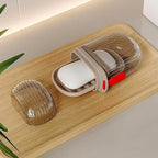 Clear plastic travel soap box with a secure lid, ideal for carrying solid soaps on trips.