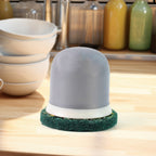 Close-up of heavy-duty kitchen scrubber with grip handle
