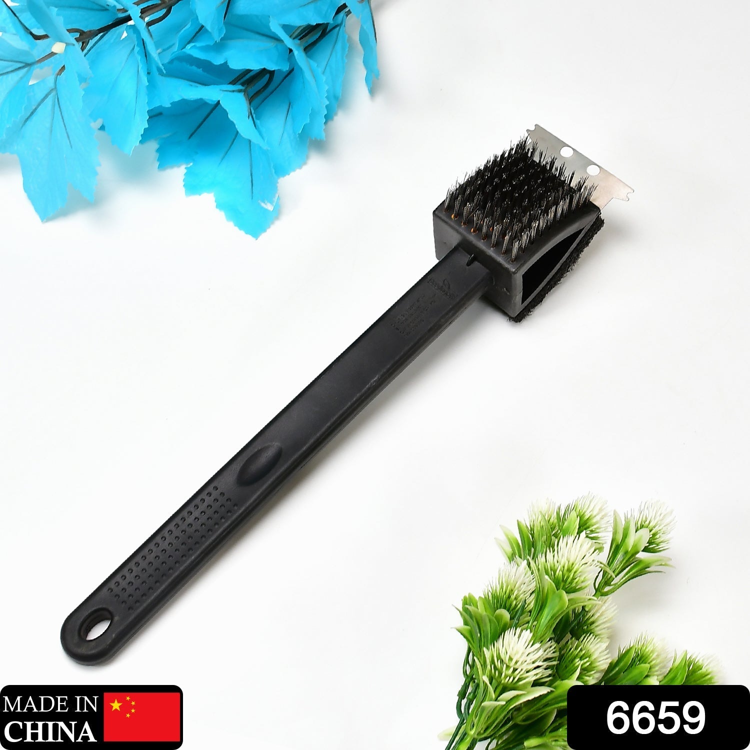 Top-down view of the black silicone toilet brush and its holder, emphasizing its compact design.