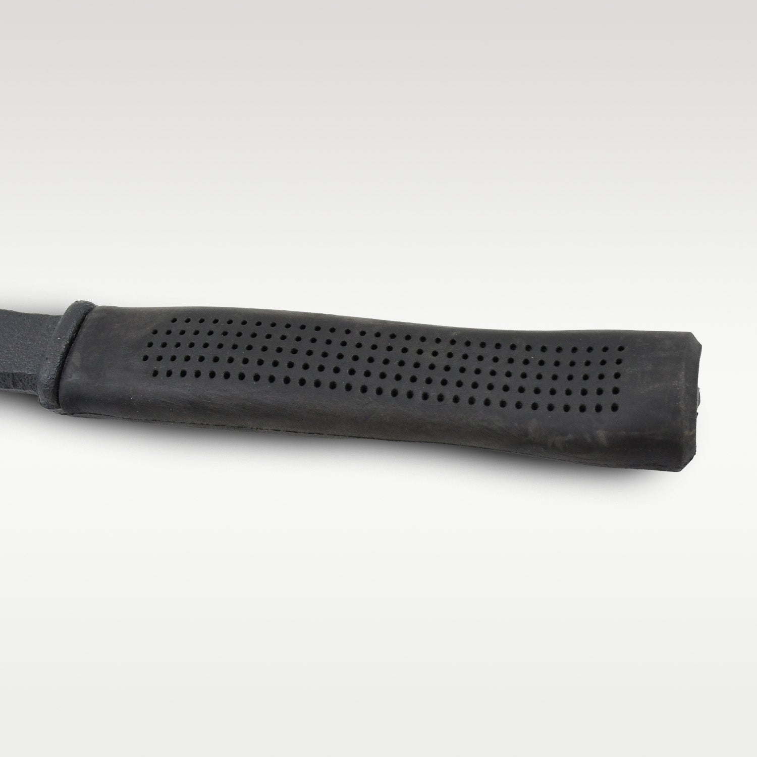 Side view highlighting the sharp cutting blade and pick axe functionality.