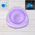 Transparent purple plastic ashtray with wide bowl and triangular shape