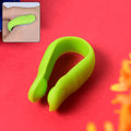Front view of the AuriGlam Migraine Relief Acupressure Clip in a neutral color.