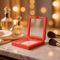 Transparent jewellery display box showing floating rings and earrings in a clear magnetic organizer