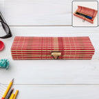 Decorative bamboo mat organizer box holding pens and cosmetics
