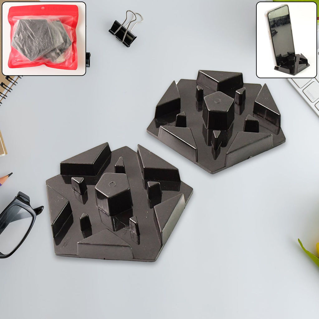 Close-up of multi-angle plastic mobile phone holder showing geometric base