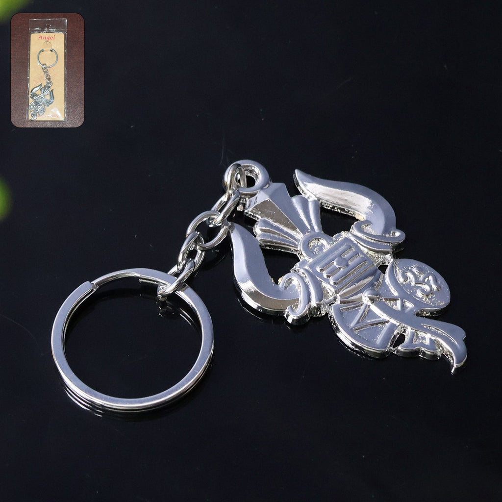 Silver metal Trishul Damru keychain shown on a white background