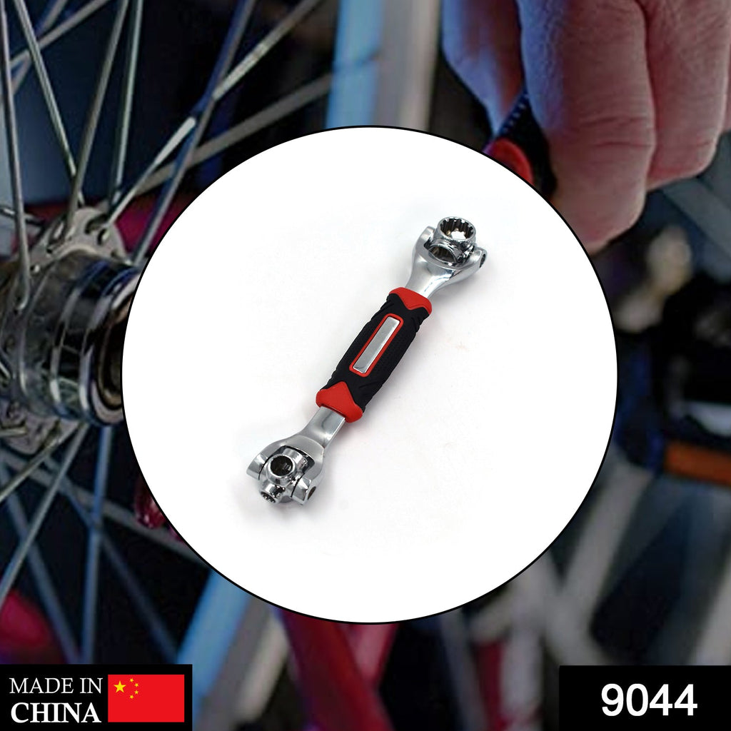 Ergonomic RaceVault multi-tool wrench demonstrating its 360-degree rotation feature.