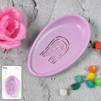 Durable PP plastic soap dish with drain, showcasing its sturdy construction and simple design.