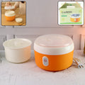 An orange Automatic Yogurt Maker machine with its lid off, ready to make fresh homemade curd.