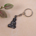 Hanuman Ji sitting pose metal keychain with detailed idol front view