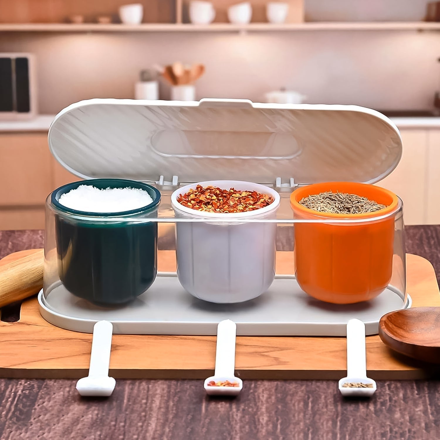 Multicolor 3-grid spice container placed on a modern kitchen counter, ready for use.