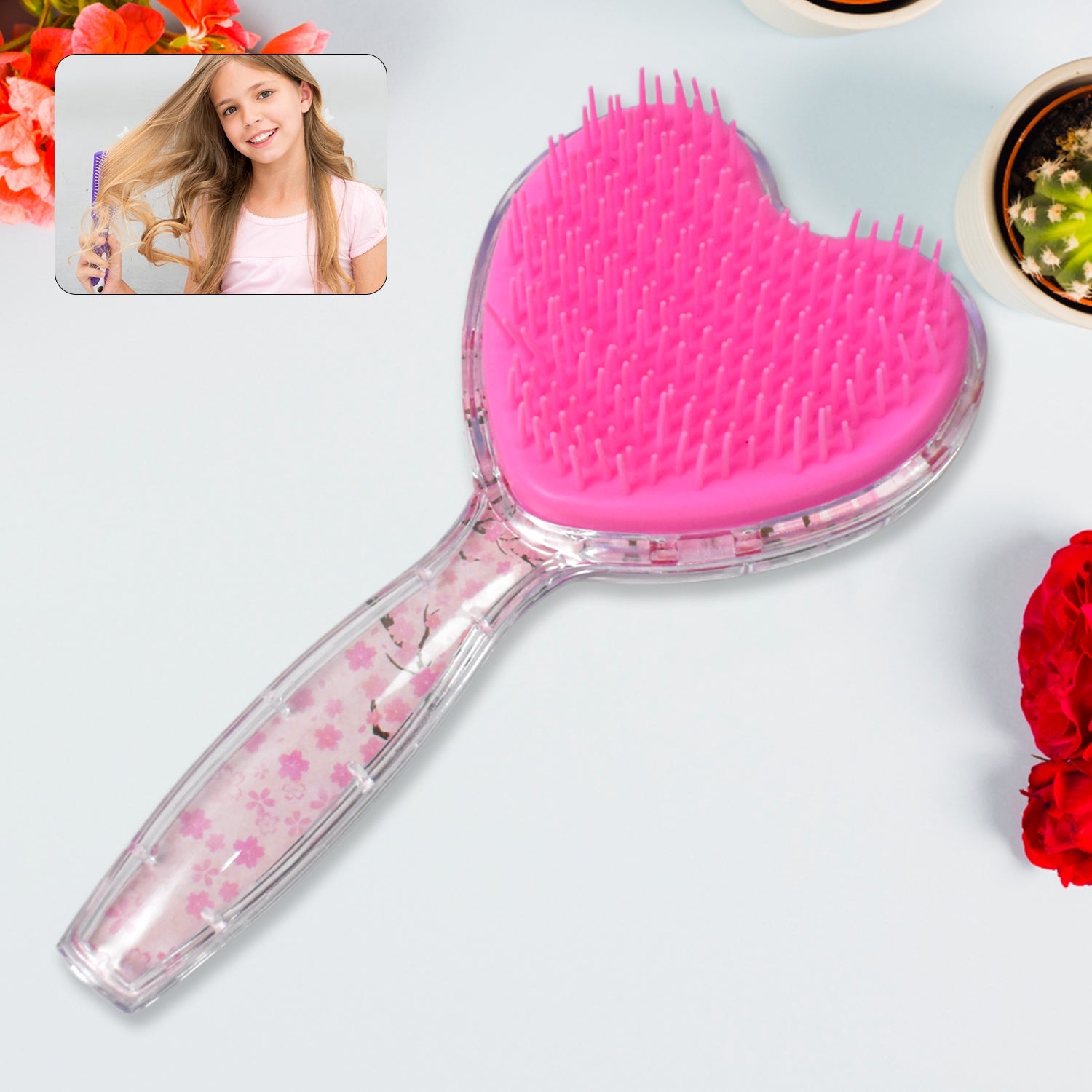 Heart shape hair brush in pink, shown with gentle bristles for kids and adults.