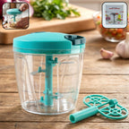 Quickslice 6 Blade Manual Food Chopper with transparent 900ml container on a kitchen counter.