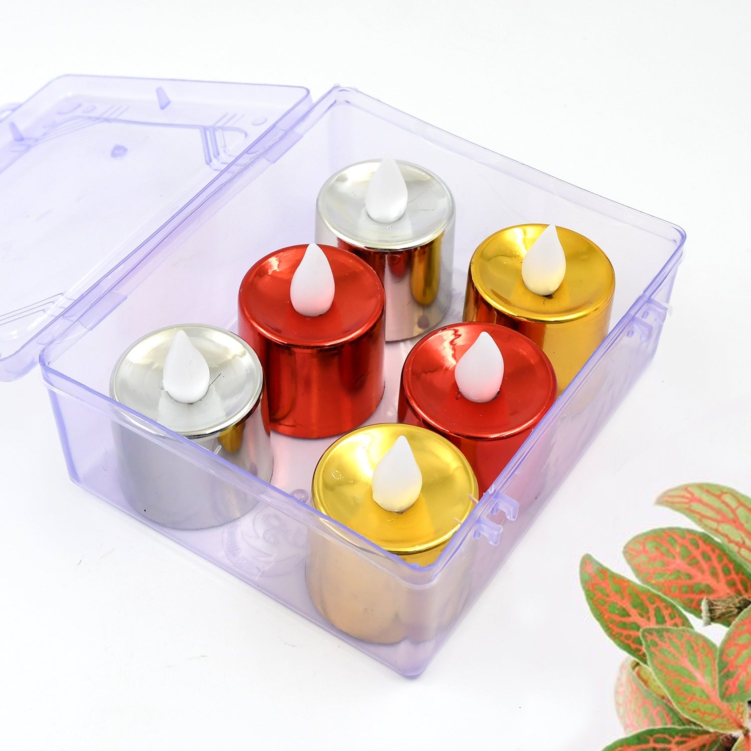 A set of six glowing LED Diya Candles in warm yellow light.