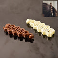 Durable plastic hair claw clip in mixed color holding hair securely